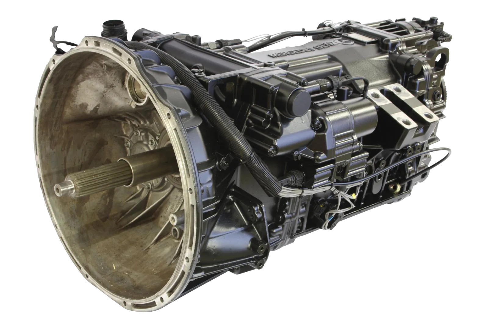 Eine Nahaufnahme eines Kfz-Getriebes mit einem Metallgehäuse, freiliegenden Zahnrädern und verschiedenen mechanischen Bauteilen.