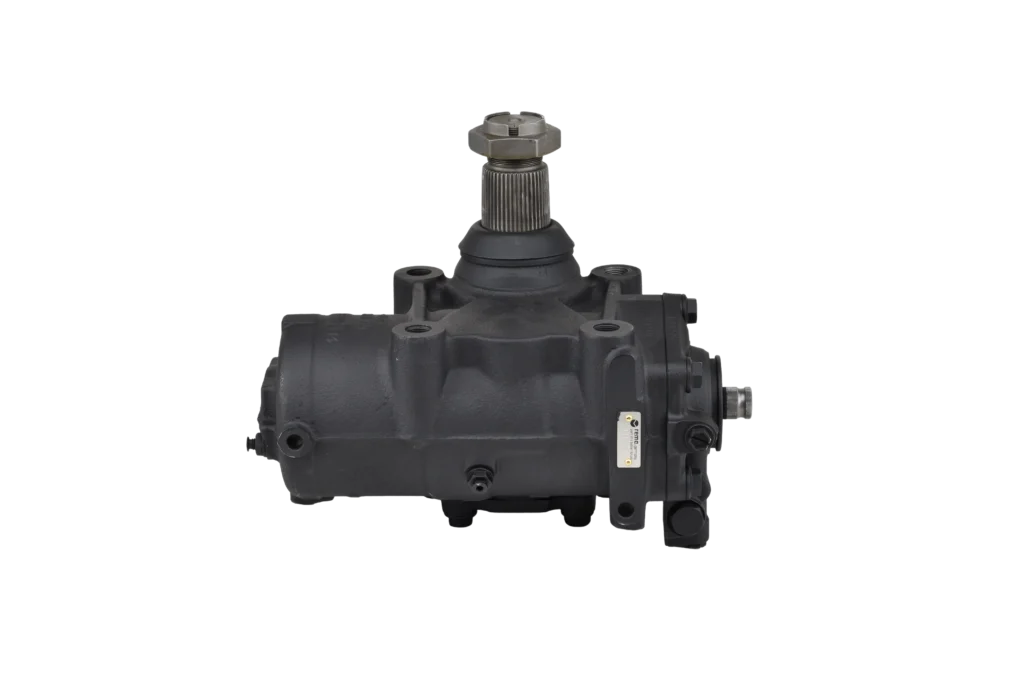 A black automotive steering gear with a metal drive shaft and various mounting points, shown against a plain white background.